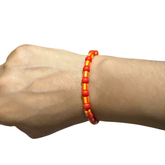 3/$20 HANDCRAFTED Red Acrylic & Striped Fuse Beaded Bracelet - Picture 2 of 3